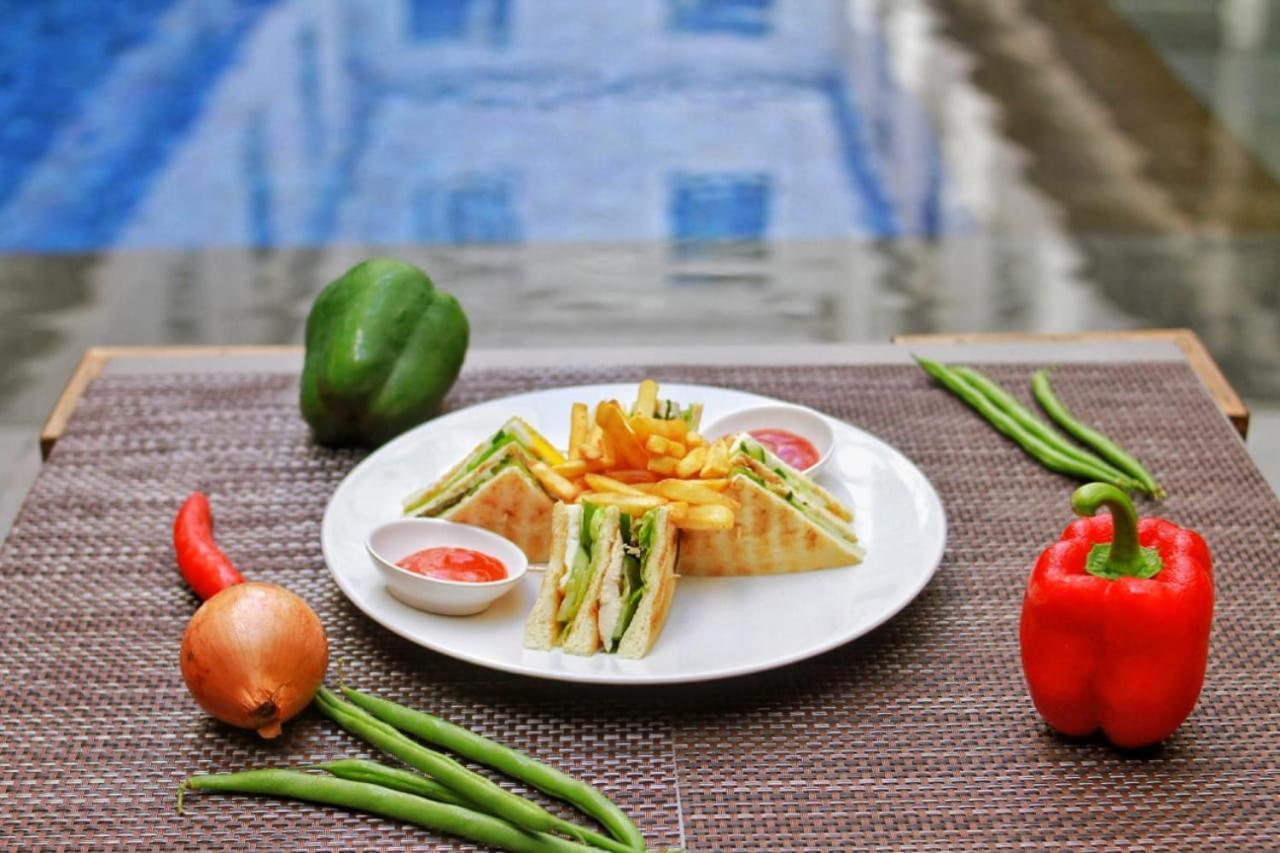 Hotel Swiss-Belexpress Kuta Legian Esterno foto